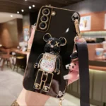 Funda-de-tel-fono-con-correa-de-soporte-de-oso-de-arena-movediza-para-Samsung-S23